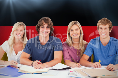 Composite image of four students looking at the camera