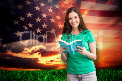 Composite image of student picking a book from shelf in library