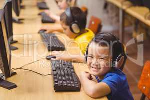 Cute pupils in computer class