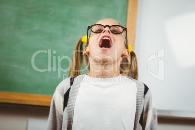 Cute pupil yelling in a classroom