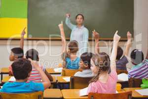 Teacher asking a question to her class