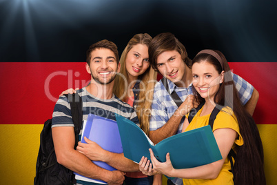 Composite image of students holding folders at college corridor