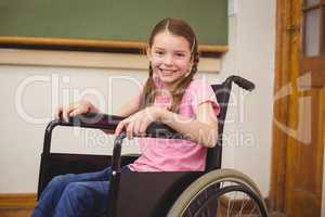 Disabled pupil smiling at camera