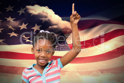 Composite image of smiling pupil with hand up