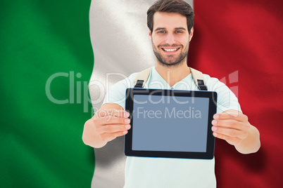 Composite image of student showing tablet