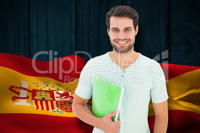 Composite image of student holding notepad