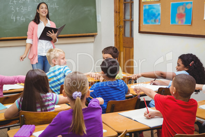 Students pointing at fellow classmate