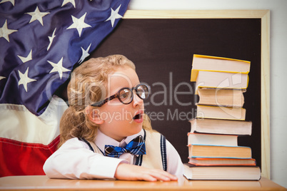 Composite image of surprise pupil looking at books