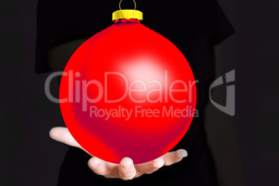 Hand holding Christmas bauble