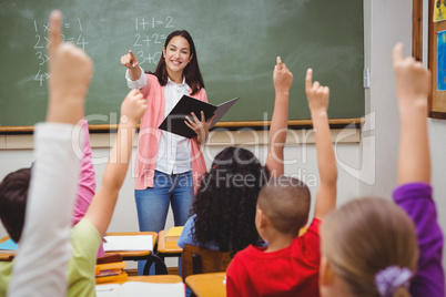 Teacher asking her students a question