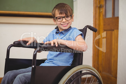 Disabled pupil smiling at camera