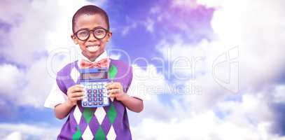 Composite image of happy pupil with calculator