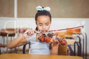 Student using a flute in class