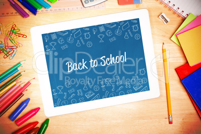 Back to school against students desk with tablet pc