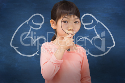 Composite image of pupil looking through magnifying glass