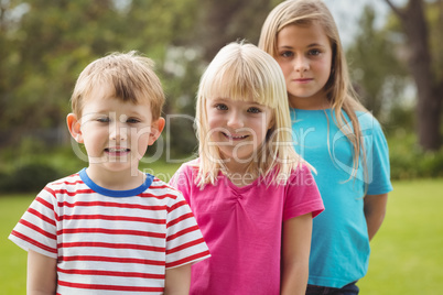 Smiling classmates looking at camera