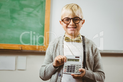 Pupil dressed up as teacher showing calculator