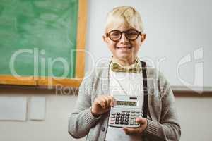 Pupil dressed up as teacher showing calculator