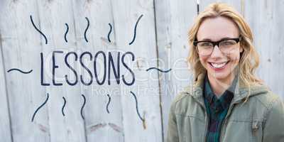 Lessons against portrait of blonde in glasses posing