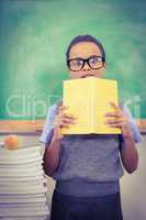 Shocked student holding a book