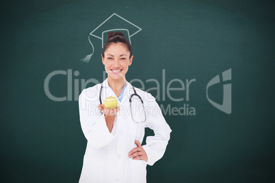 Composite image of smiling doctor offering an apple