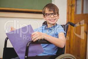 Disabled pupil smiling at camera