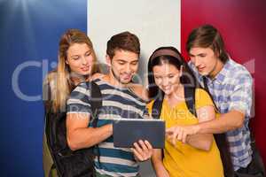 Composite image of students using digital tablet at college corr