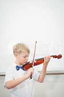 Concentrating Student playing a violin