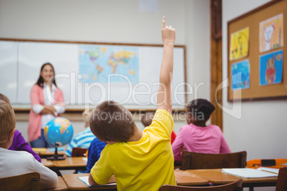 Student raising hand to ask a question