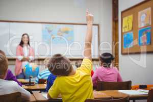 Student raising hand to ask a question