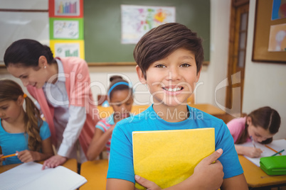 Pupil smiling at camera during class Pupil smiling at camera during class