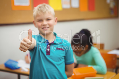 Smiling student with thumbs up