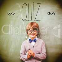 Quiz against portrait of cute little boy holding stick