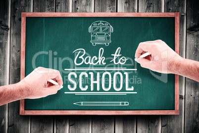 Composite image of hand writing with chalk Composite image of hand writing with chalk