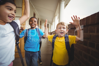 Happy pupils leaving the classroom
