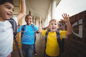 Happy pupils leaving the classroom