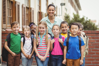 Cute pupils with their teacher