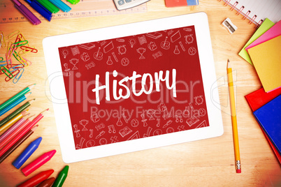 History against students desk with tablet pc