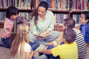 Teacher reading her pupils a story