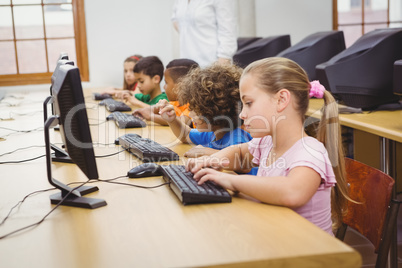 Students using computers in the classroom