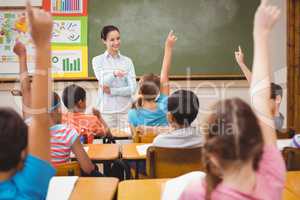 Teacher asking a question to her class