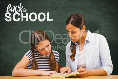 Composite image of teacher and girl reading book in library