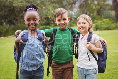 Happy Students wearing school bags