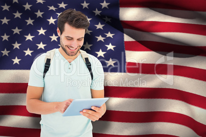 Composite image of student using tablet pc