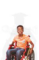Portrait of boy sitting in wheelchair at library