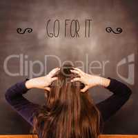 Go for it! against confused pupil looking at chalkboard