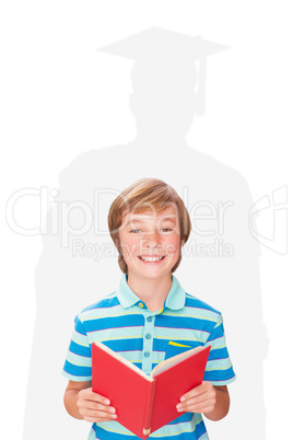 Composite image of cute pupil smiling at camera in library