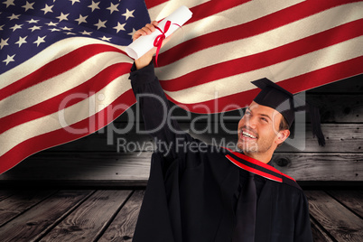 Composite image of happy attractive boy celebrating his graduati