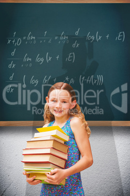 Composite image of cute little girl carrying books in library