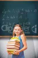 Composite image of cute little girl carrying books in library